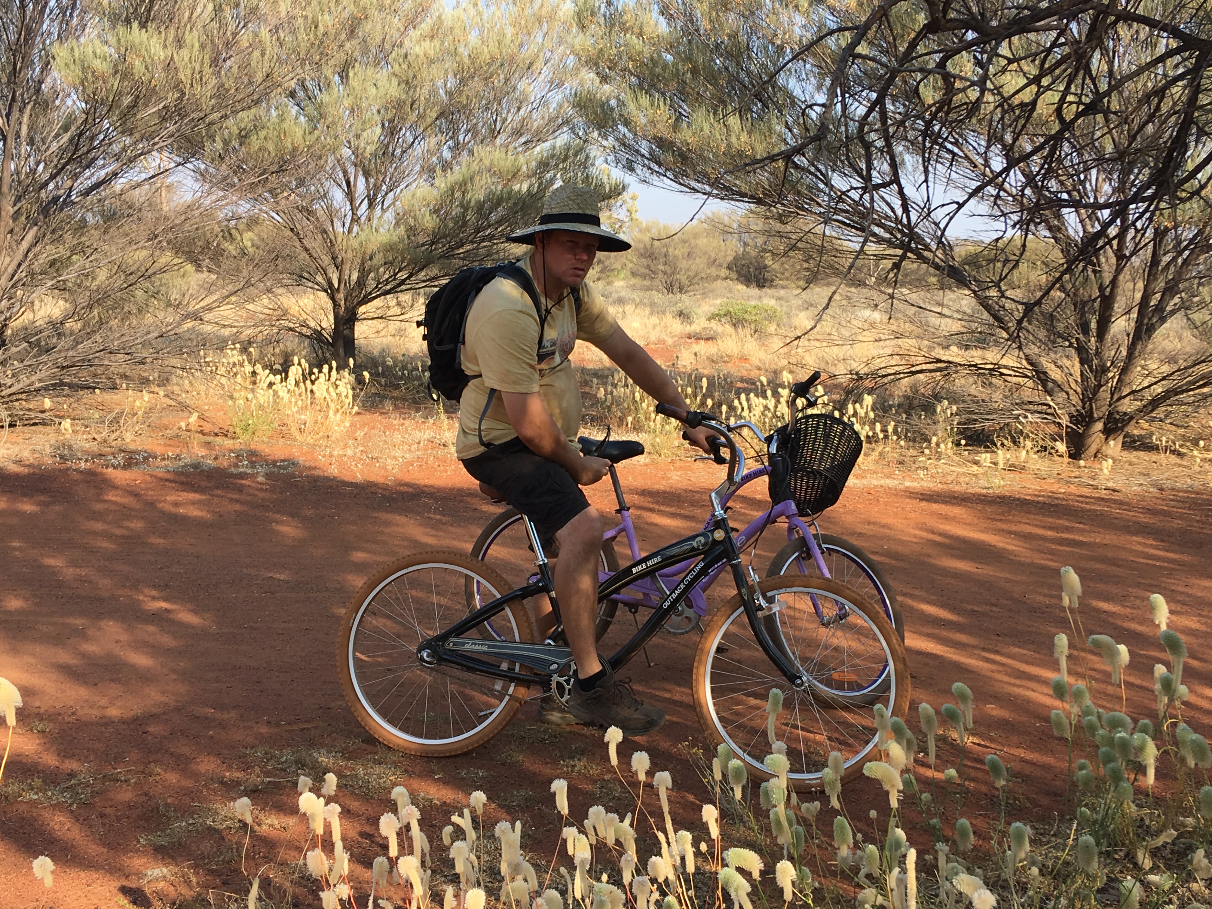 After waking up to see the sunrise, we set off early to go and cycle around Uluru.
