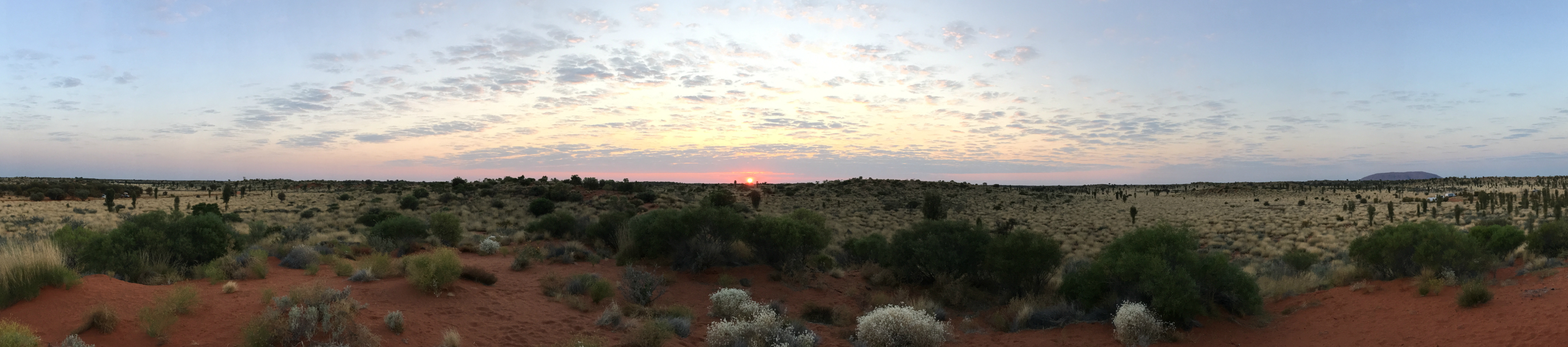 After waking up to see the sunrise, we set off early to go and cycle around Uluru.