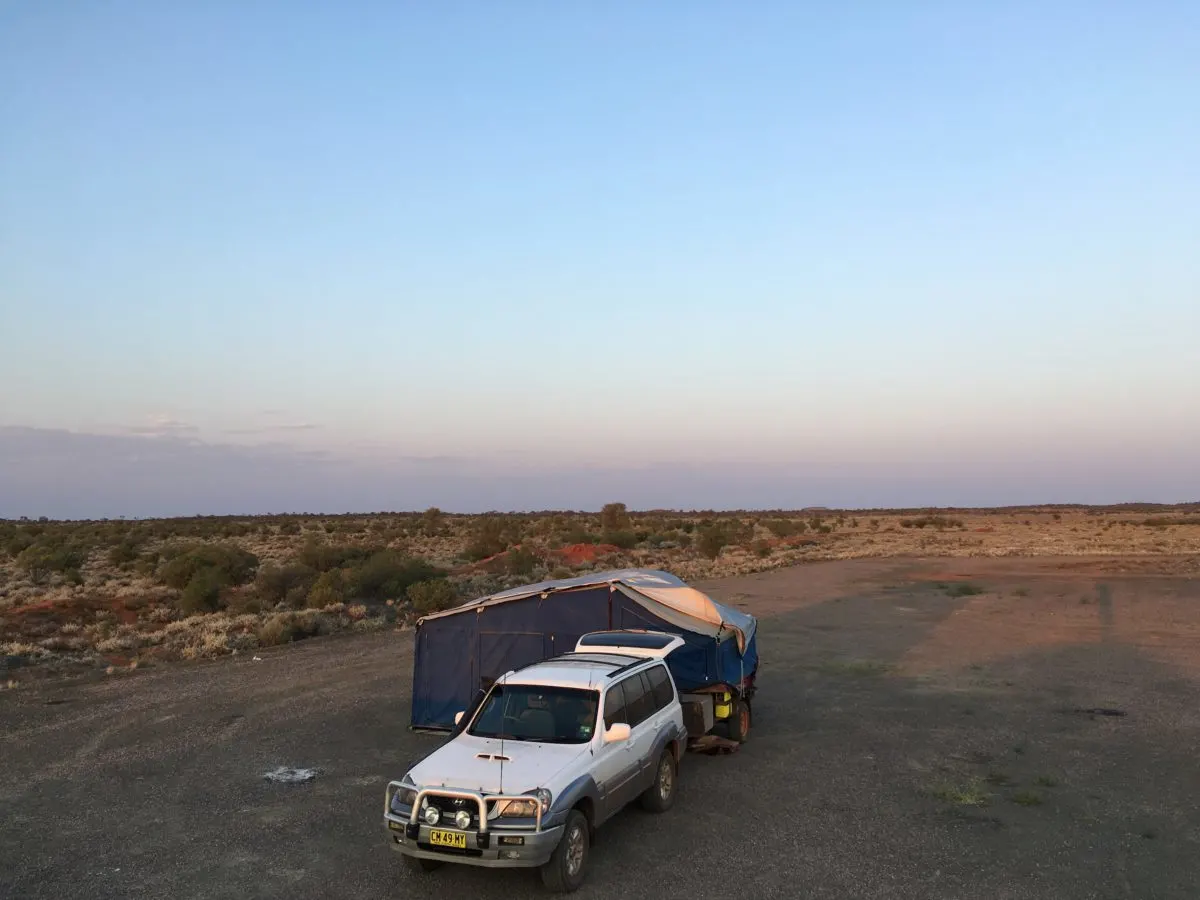 Car and tent set up at a free camp in South Australia