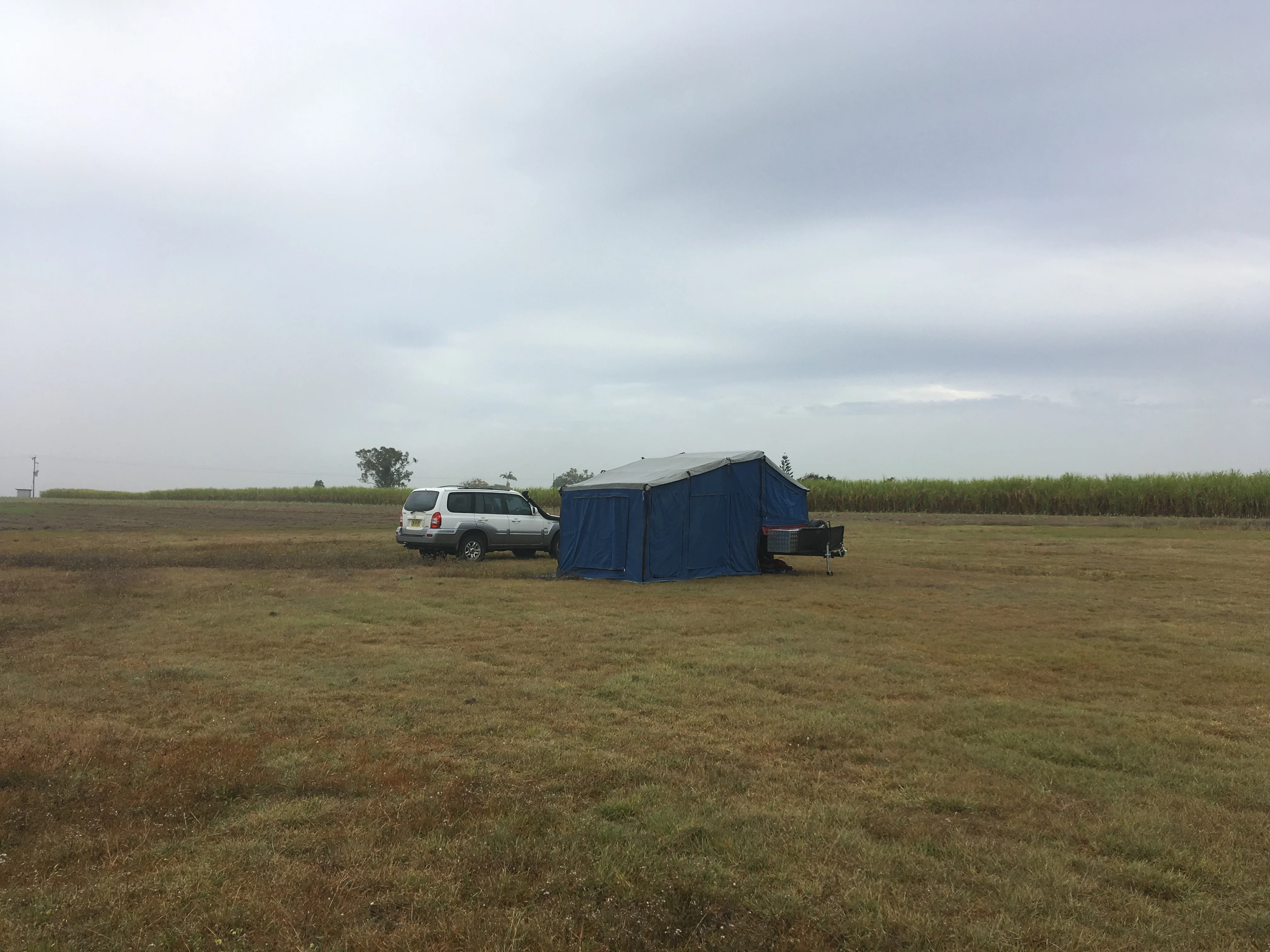 Camper trailer in a field - Free camp at Gargett Rodeo Grounds, QLD