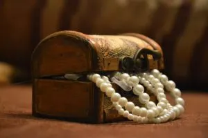 Jewellery box with a pearl necklace spilling out