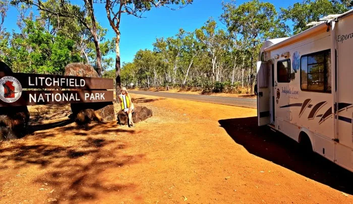 Motorhome stopped beside the sign for Litchfield National Park
