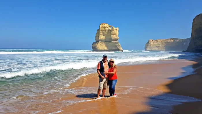 Couple standing on the beach at Gibson Step
