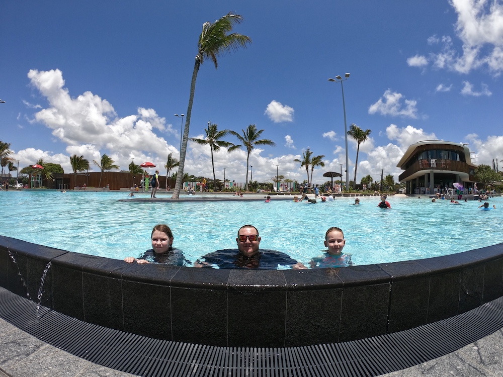 Man and two children in a large swimming pool - Australia