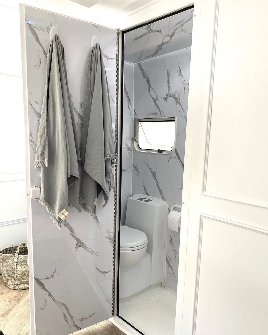 White and grey caravan bathroom interior