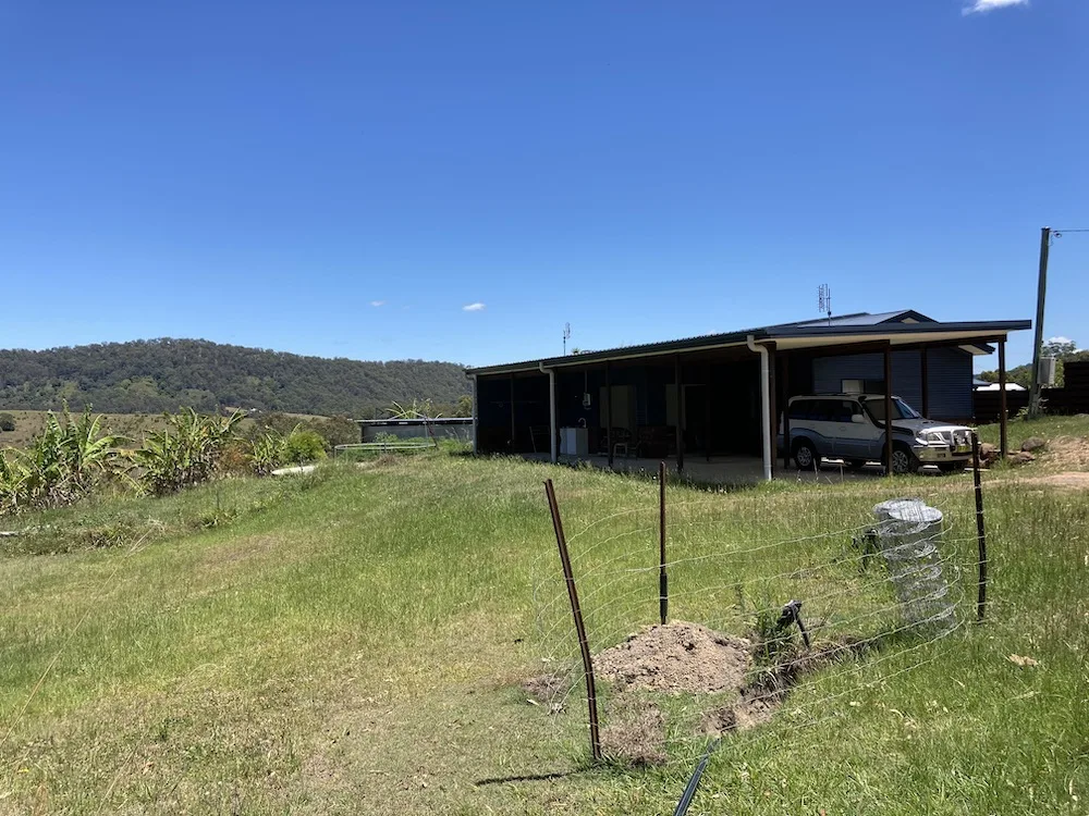 AirBnB home on green hills on a rural property