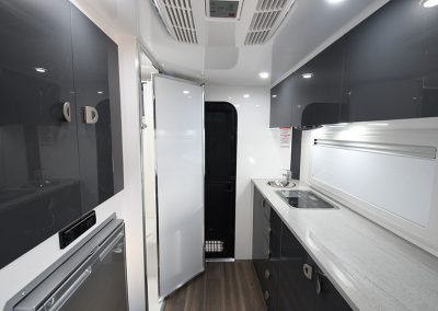 Interior of a Crusader Caravans Chameleon Action SV looking towards the door in the rear.