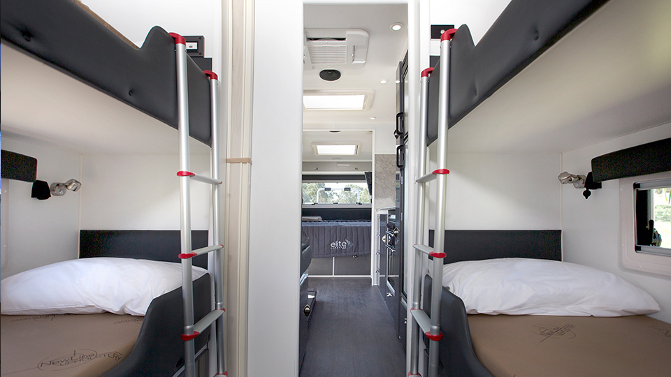 The Hume Series 4 - 4 Bunk caravan showing 2 sets of double bunks.