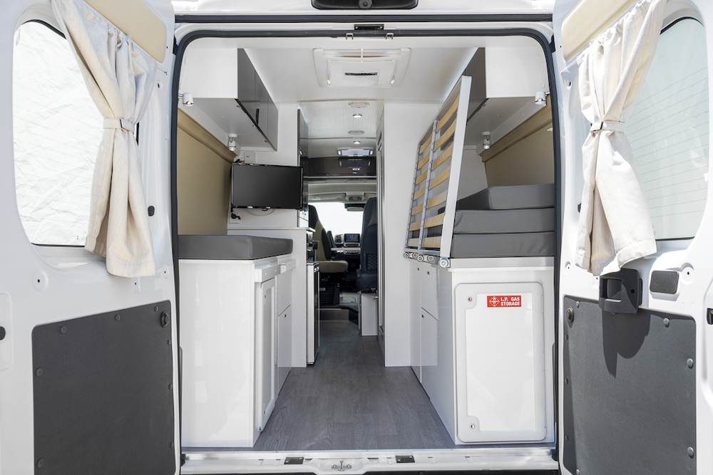 Interior view of the Windsor Otway camper van from the rear of the van showing the bed/garage conversion area.