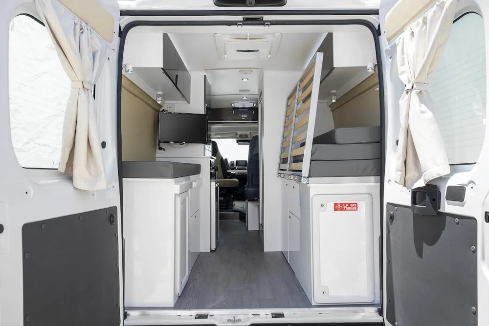 Interior view of the Windsor Otway camper van from the rear of the van showing the bed/garage conversion area.