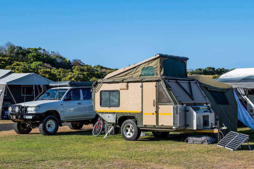 Hybrid caravan set up at a campsite in South Australia.