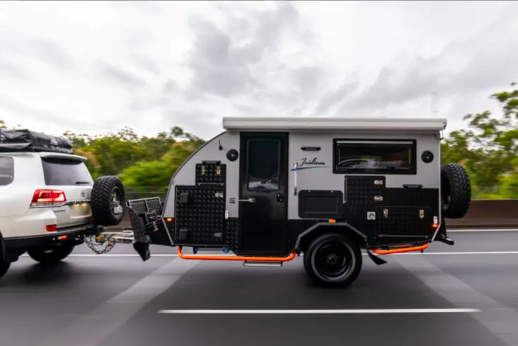 Exterior side view of the Iridium 13 Hybrid Camper Trailer.