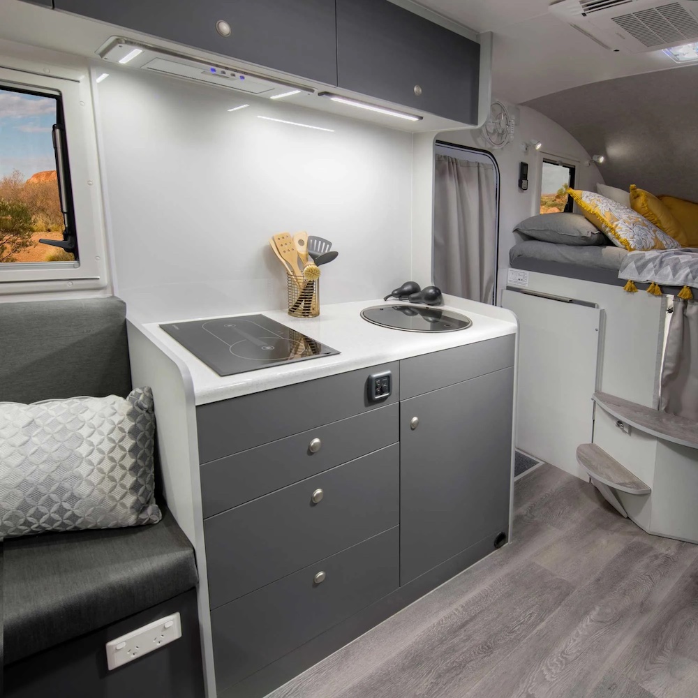 Interior view of the Pathfinder by Explorer Motorhomes, showing the bed in the luton peak.