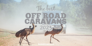Emus running in front of a car and caravan on an outback road, with text: The best off road caravans 2022.