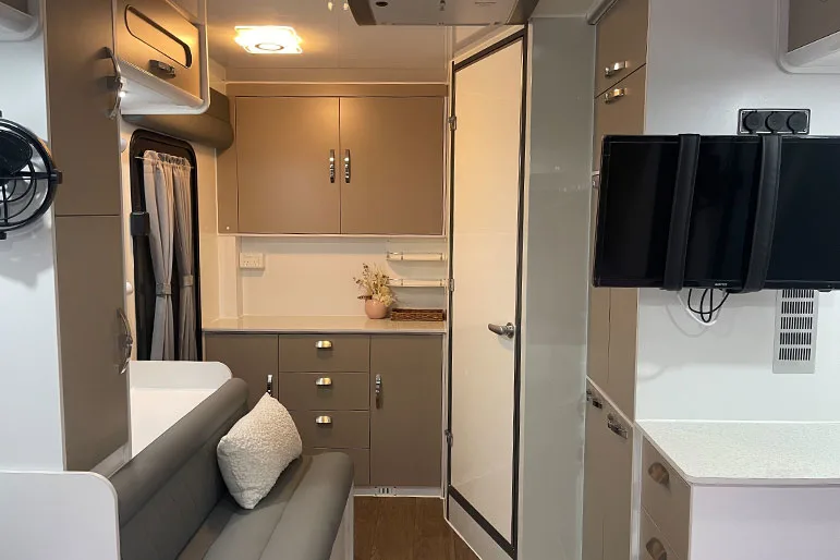 Interior view of the Ezytrail Ceduna MK3 Twin off road caravan showing the rear end of the caravan.