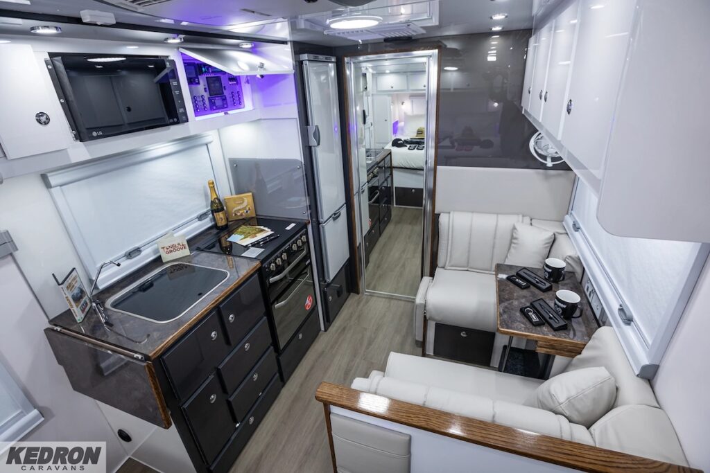 Interior view of the Kedron CP5 Compact off road caravan showing the kitchen and dining area.