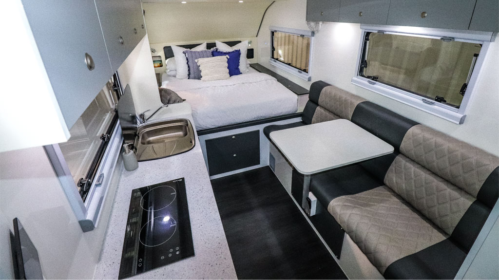Interior view of the Rhino Max Lost Track 18.5ft hybrid off road caravan.