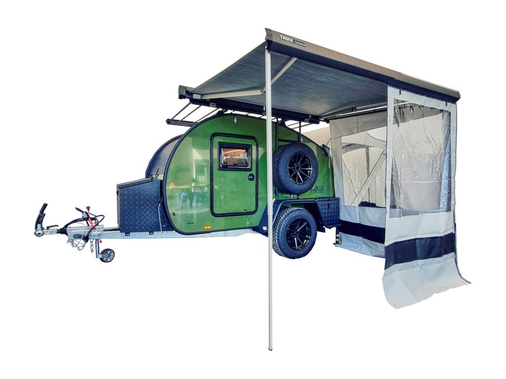 Exterior view of the Hero Ranger tear drop camper with the awning and annex set up.